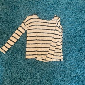 Thinner white and black striped sweater. Worn it under many vests.